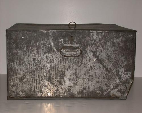 Tin bread box with hinged front and keyhole.