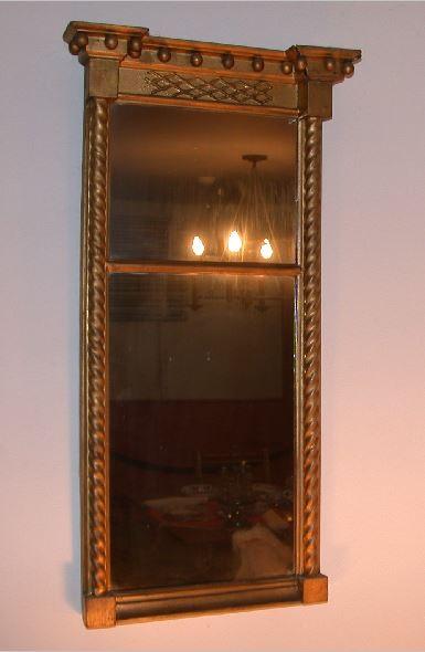 Gilt framed mirror with turned columns on sides